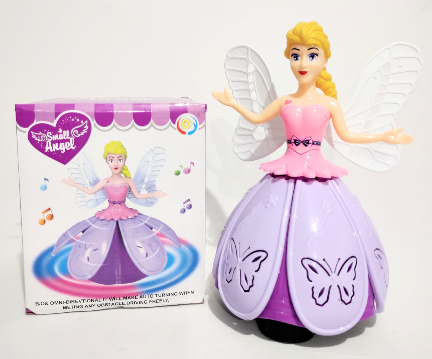 D - BONECA BATE VOLTA Á PILHA COM SOM E ILUMINAÇÃO (CAIXA FECHADA R$ 32,90 + FT -> 12 PEÇAS)